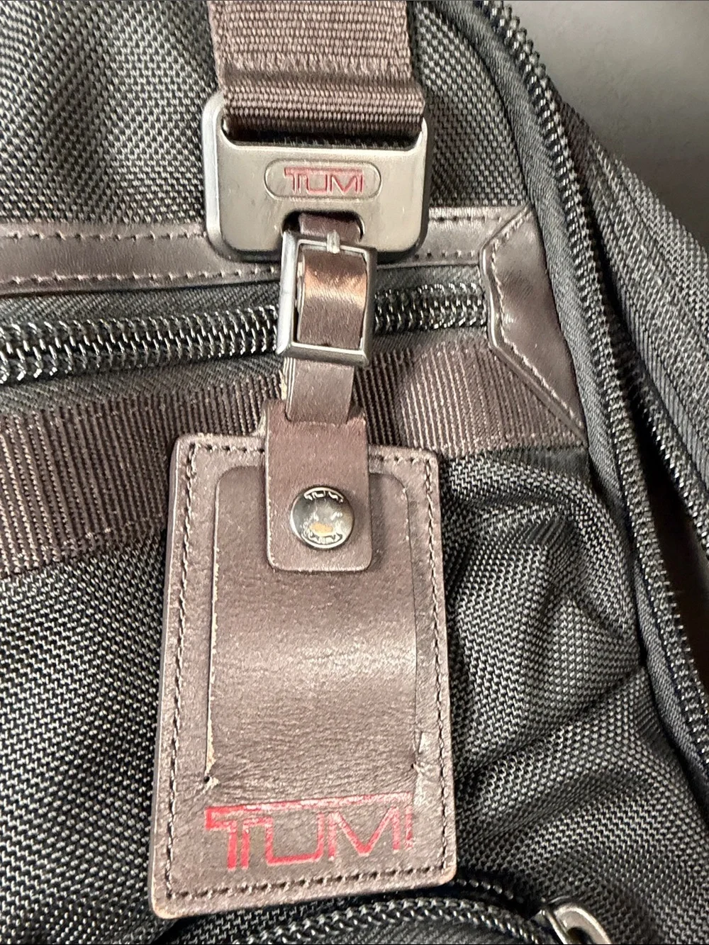 Tumi Alpha Bravo Tacoma backpack in black ballistic nylon with leather trim